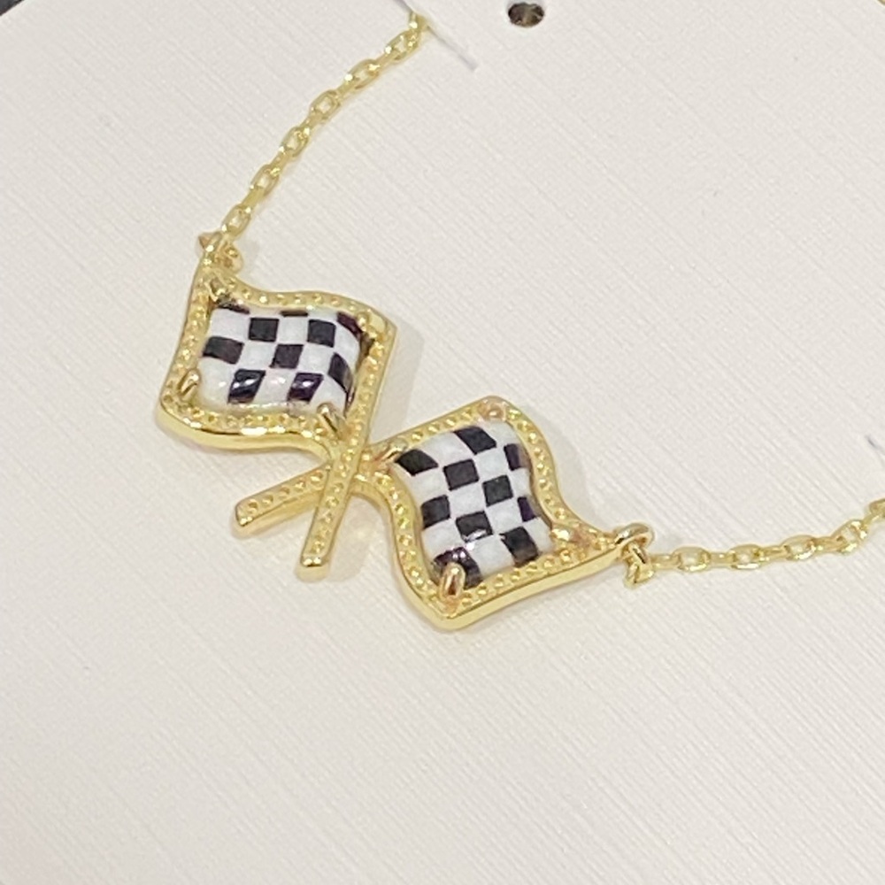Kendra Scott Gold Necklace with Black and White Checkered Flag Charms